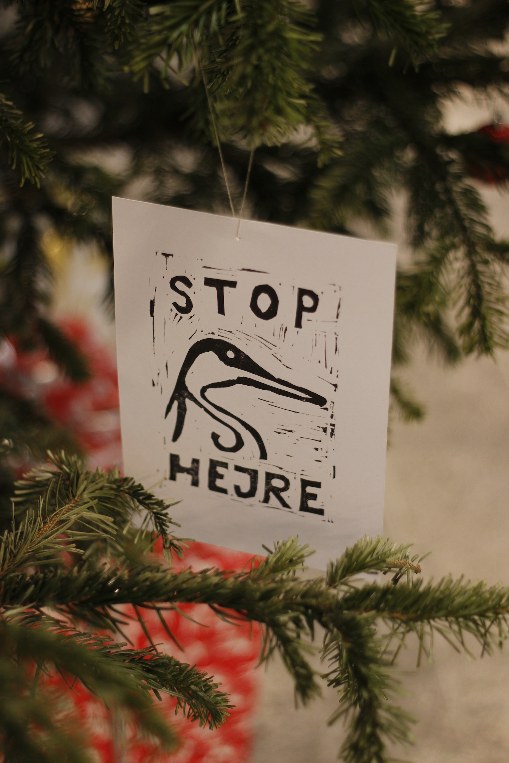 Stop hejre postkort på juletræ